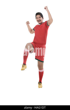 Image of winning football player after scoring isolated over white background Stock Photo