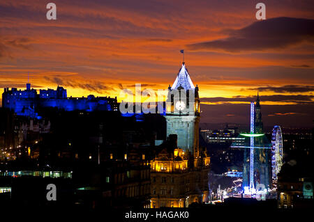 Edinburgh city from Calton Hill, Scotland. 30th Nov, 2016. St Andrew's Day is the national day in Scotland. Historic buildings such as the castle were bathed in a blue hue, plus a spectacular sunset. Stock Photo