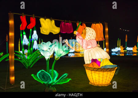 Longleat, Warminster, Wiltshire, UK. 1 December 2016. Christmas Festival of Light at Longleat to celebrate the Safari Park's 50th anniversary with the theme of Beatrix Potter. Crowds flock to see the lights on a bitter cold evening. Mrs Tiggy-Winkle hanging out washing on line. Credit:  Carolyn Jenkins/Alamy Live News Stock Photo