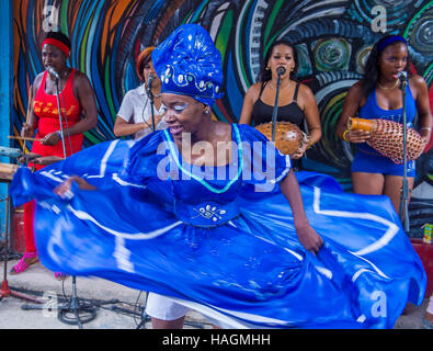 Rumba dancers in Havana Cuba. Rumba is a secular genre of Cuban music involving dance, percussion, and song. It originated in the northern regions of Stock Photo