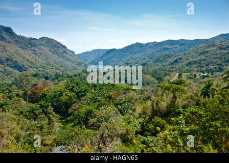 Looking out from the El Nicho area of the Sierra del Escambray, Cuba. Paths lead through the Parque Natural Topes de Collantes. Stock Photo
