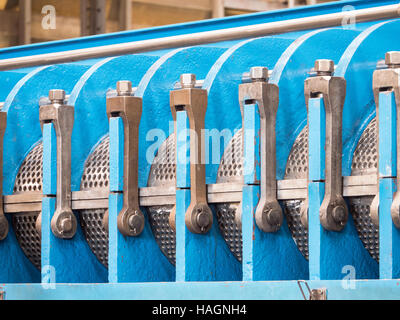 Detail photo of twin screw industrial press for processing, of food byproducts. Stock Photo