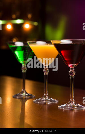 Three exotic cocktails in bar Stock Photo