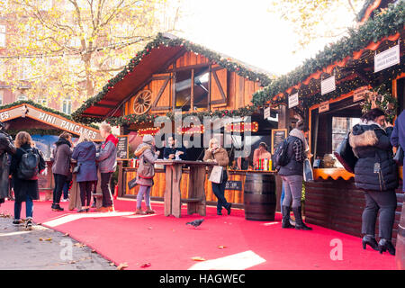 Bavarian style hut food stalls at the Christmas Market in Leicester Square, 2016, London, UK Stock Photo