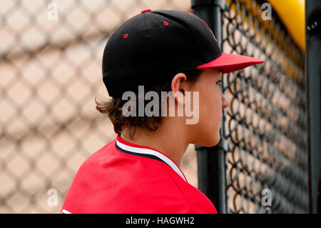 Profile of American baseball player close up in the dugout. Stock Photo
