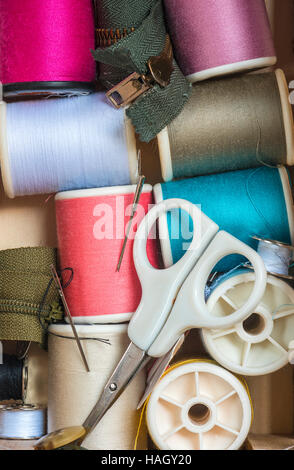 Sewing Supplies in wooden box Stock Photo
