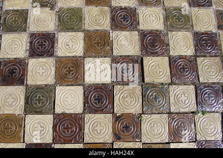 ISLE OF MAN, UK, AUGUST 16, 2016: Handmade reproduction 19th tiles in the floor of the Chapter House at Rushen Abbey, Ballasalla Stock Photo