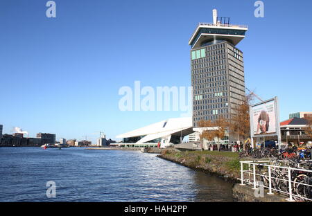EYE Film Institute Netherlands, Amsterdam. Dutch Film archive & museum in Amsterdam-Noord at IJ River. In front A'dam tower 360 Stock Photo