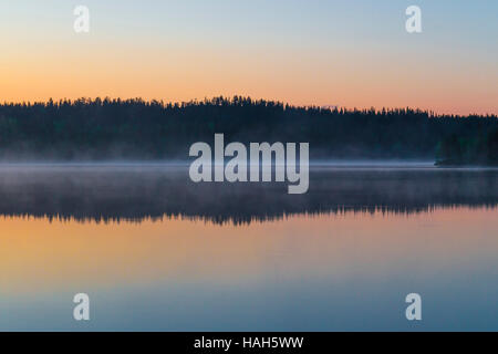 Lake Porontima, sunset with reflections on the water Stock Photo