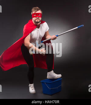 Super hero with cleaning equipment Stock Photo