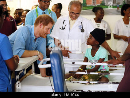 Prince Harry meets staff and patients at the Queen Elizabeth Hospital in Bridgetown, Barbados on the country's 50th anniversary of independence, during his tour of the Caribbean. Stock Photo