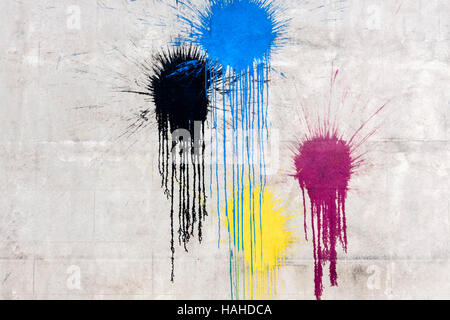 Smooth brick wall with paint ball splashes Stock Photo