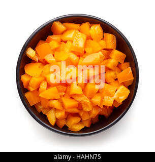 Bowl of chopped bell pepper isolated on white background, top view Stock Photo