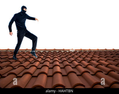 Thief on the roof Stock Photo