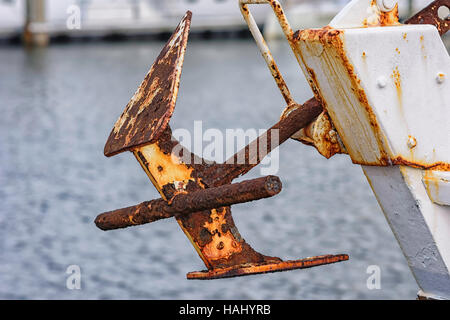 Old rusted anchor on shrimp boatc Stock Photo