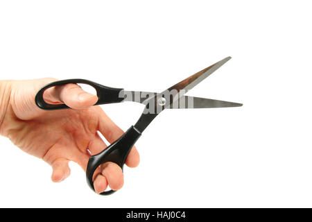 Scissors in hand isolated on white Stock Photo