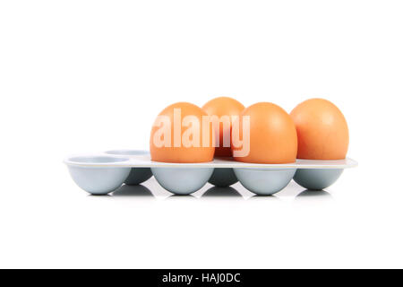 eggs in holder isolated on white background Stock Photo