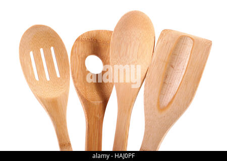 Wooden kitchen utensils isolated on neutral background Stock Photo