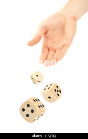 Hand throwing dice Stock Photo