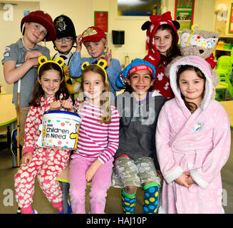 Primary school pupils in costume posing for a picture for Children in Need 2016, Hampshire, UK. Stock Photo