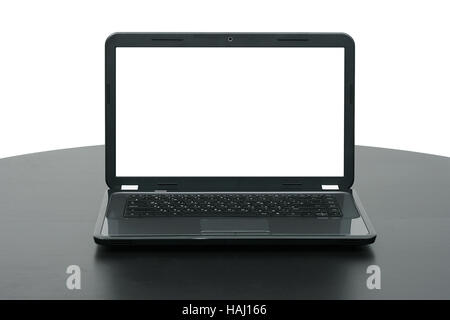 laptop with blank screen on wooden table Stock Photo