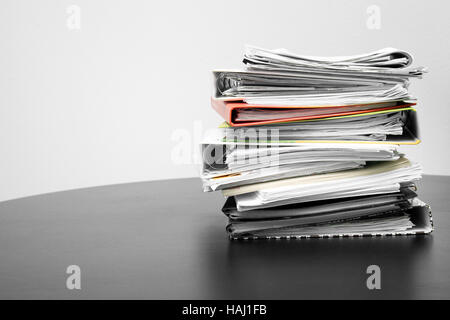 stack of folders and documents on office table Stock Photo