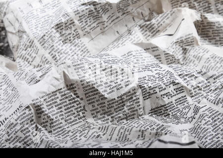 background of old crumpled newspaper Stock Photo