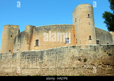 ancient medieval castle against blue sky in Mallorca Stock Photo