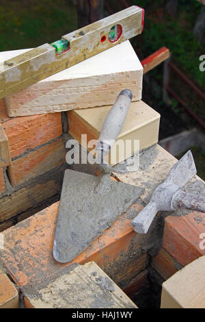 building a brick chimney Stock Photo