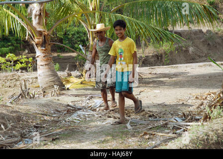Granddad and grandson, Jungle, Lawigan, San, Joaquin, Iloilo, Philippines. Stock Photo