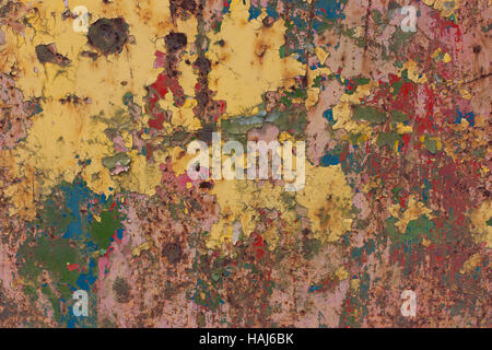 Rusty, with multi-colored peeling paint, old, vintage background.red, blue, yellow, green paint Stock Photo