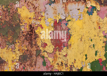 Rusty, colorful old vintage background.red, blue, yellow, green paint Stock Photo