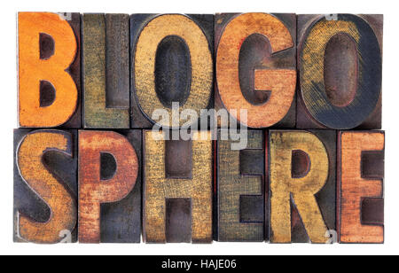 blogosphere (global blog community) word abstract in vintage wood letterpress types, stained by ink, isolated on white Stock Photo