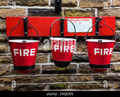 Old fire baskets at the Ingrow railway station, part of the Keighley and Worth Valley Railway, Ingrow, Yorkshire, UK Stock Photo