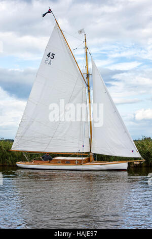 Sailing boat on river Thurne, Norfolk, UK Stock Photo