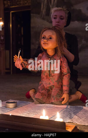 London, UK. 30 November 2016. Puppeteer Edie Edmundson performing with The Little Matchgirl. The Sam Wanamaker Playhouse presents The Little Matchgirl and Other Happier Tales from the stories of Hans Christian Andersen. Written an co-adapted by Joel Horwood, direction and co-adapted by Emma Rice. Performances from 24 November 2016 to 22 January 2017. Performers: Paul Hunter, Japjit Kaur, Akiya Henry, Bettrys Jones, Kyle Lima, Jack Shalloo and puppeteer Edie Edmundson. Stock Photo
