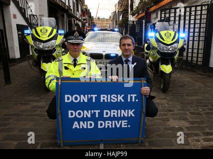 Embargoed to 0001 Friday December 2 Scottish Justice Secretary Michael Matheson(r) joins Police Scotland Assistant Chief Constable Bernard Higgins as Police Scotland launches their annual festive drink-drive campaign in Glasgow. Stock Photo
