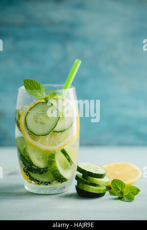 Cucumber, lemon and mint infused water. Detox water, fruit flavored water, or fruit infused water. Stock Photo