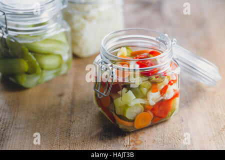 Pickled vegetables in glass jars Stock Photo