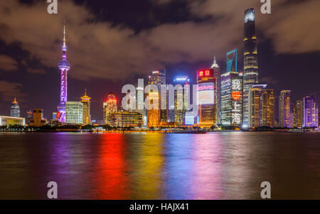Shanghai Night - A night view of the skyscrapers of Lujiazui Pudong New Area at east bank of Huangpu River in central Shanghai. Stock Photo
