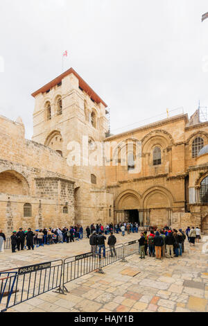 JERUSALEM, ISRAEL - APR 10, 2015: Pilgrims in front of the Holy Sepulcher Church on Orthodox Good Friday, in the old city of Jerusalem, Israel Stock Photo