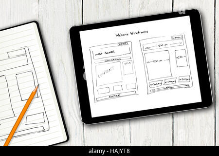 website wireframe sketch on digital tablet screen Stock Photo