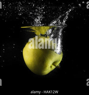 apple splash in water on black Stock Photo