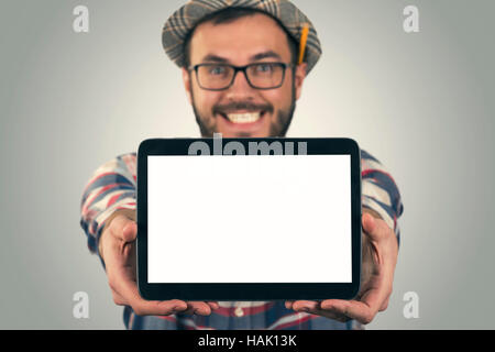 young happy attractive man showing blank digital tablet Stock Photo