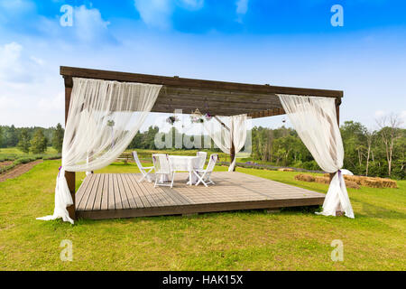 romantic tranquil scene with pergola on the hill Stock Photo
