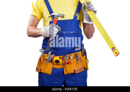 construction worker with belt and tools in hands on white Stock Photo