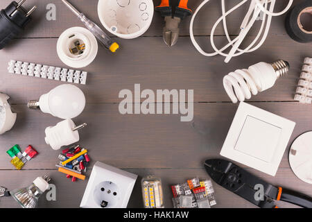top view of electrical tools and equipment on wooden table Stock Photo