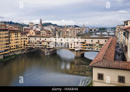 The Ponte Vecchio , Medieval stone closed-spandrel segmental arch bridge over the Arno River, Florence, capital of Tuscany region, Italy Stock Photo