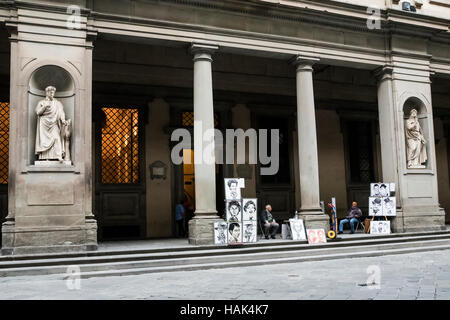 Street artists and antique sculptures, Florence, capital of Tuscany region, Italy Stock Photo