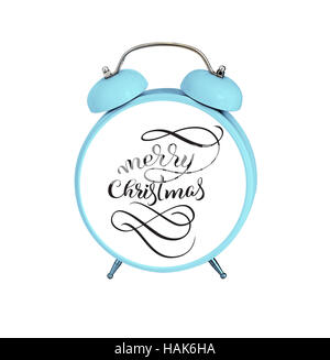 mechanical alarm clock isolated on white background and text Merry Christmas. Calligraphy lettering Stock Photo